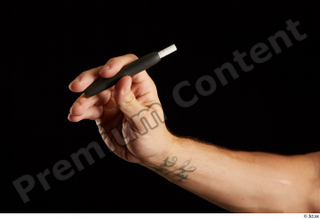Hands of Max Dior  1 elektronic cigarette hand 0001.jpg